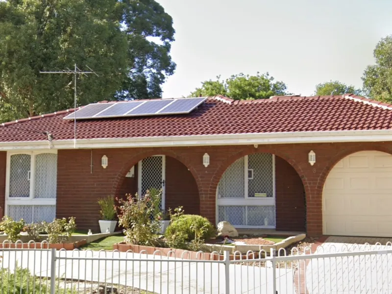 Perth roof with Heritage Red Dulux Acratex coating - view 1