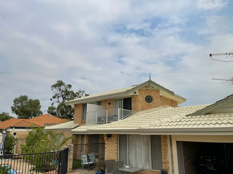 Perth roof with Cream Dulux Acratex coating - view 1