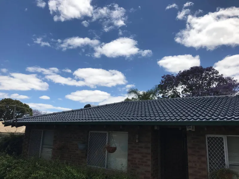 Perth roof with Dark Grey Dulux Acratex coating - view 1