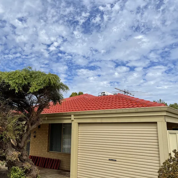 Perth roof with Tuscan Red Dulux Acratex coating