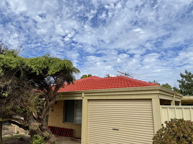 Perth roof with Tuscan Red Dulux Acratex coating - view 1