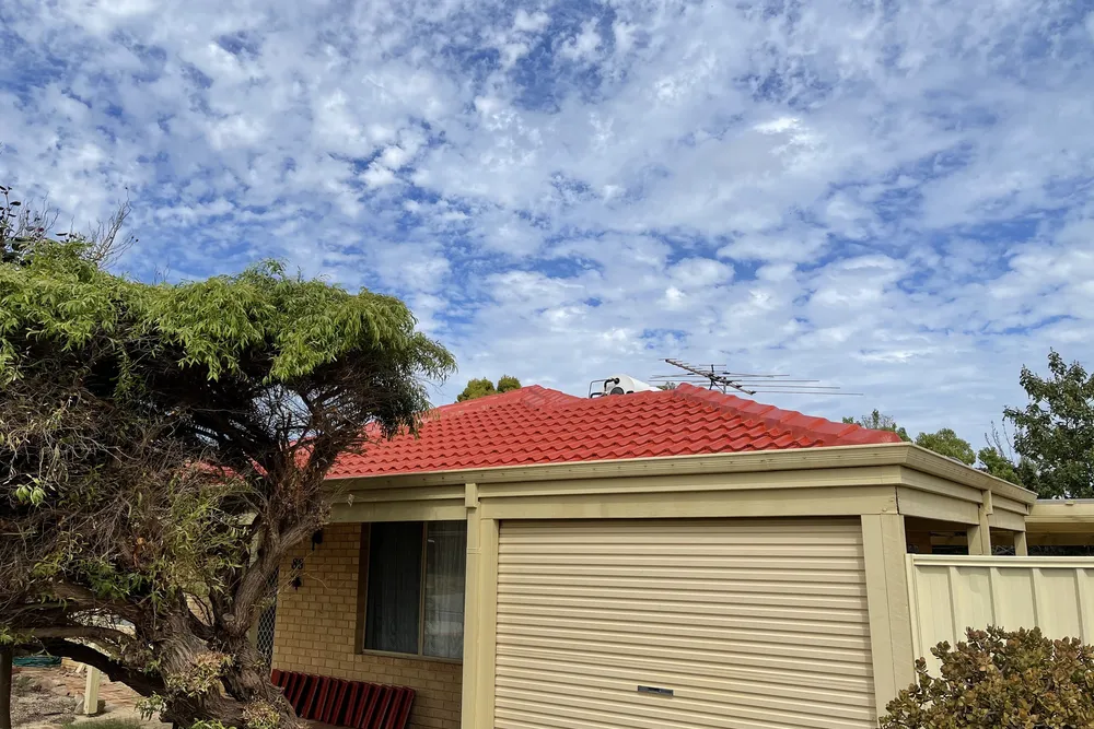Perth roof with Tuscan Red Dulux Acratex coating