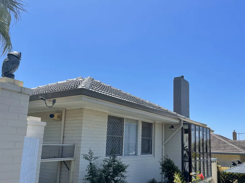 Perth roof with Colorbond Jasper Dulux Acratex coating - view 1