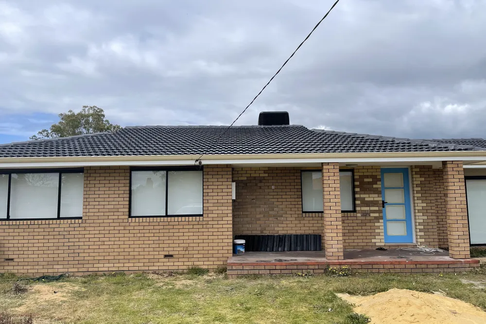 Perth roof with Ebonite Dulux Acratex coating