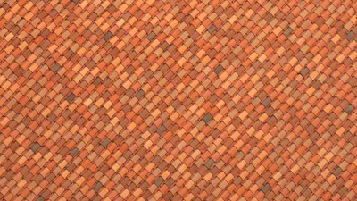 Aerial view of a building with a new metal roof installation