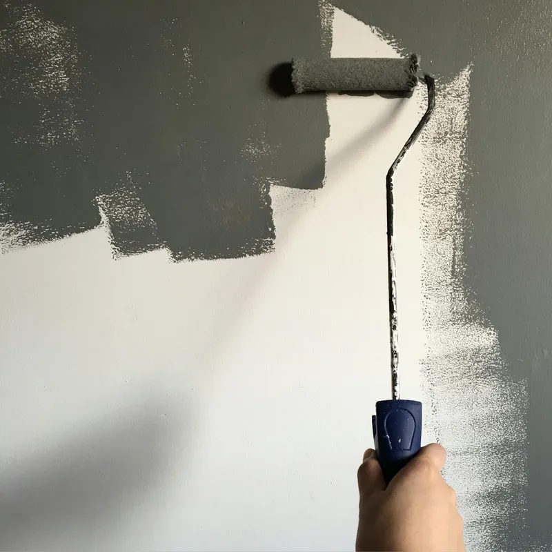 Paint roller being used for a coating application
