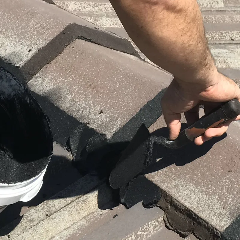 Ridge cap pointing being applied during a Perth roof restoration