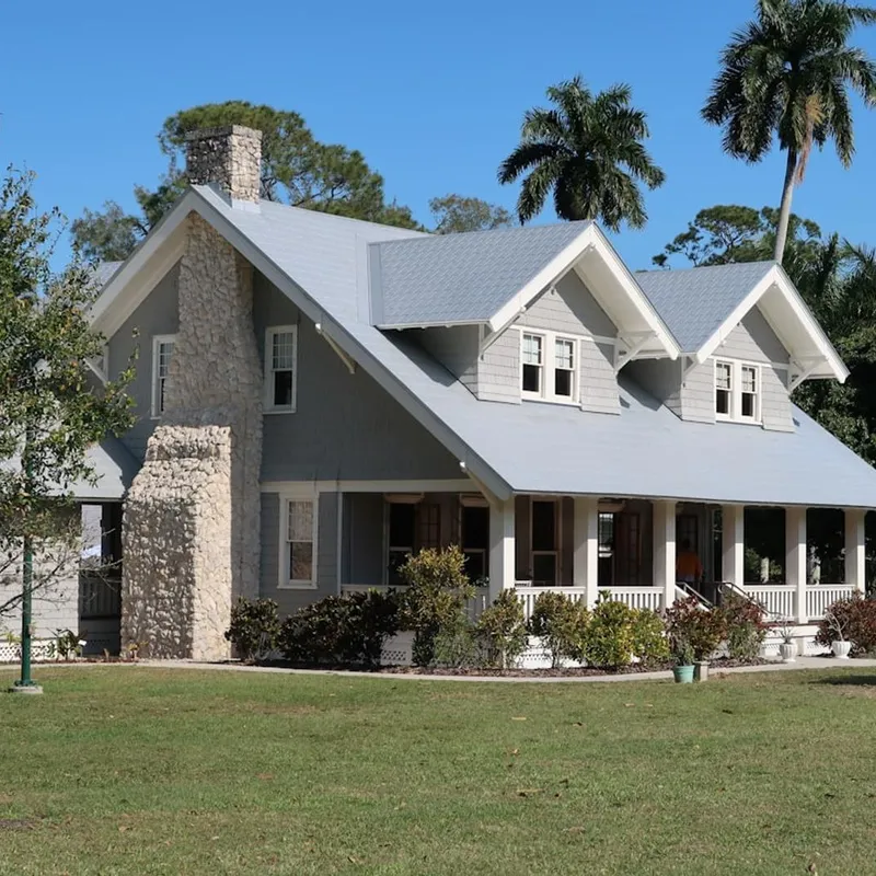 Older home showing signs of roof aging and weathering