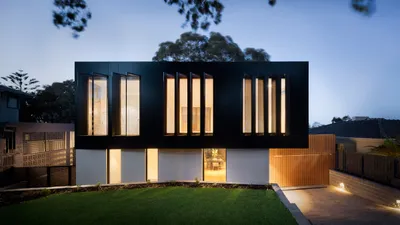 Modern home exterior showing roofline and flashing details