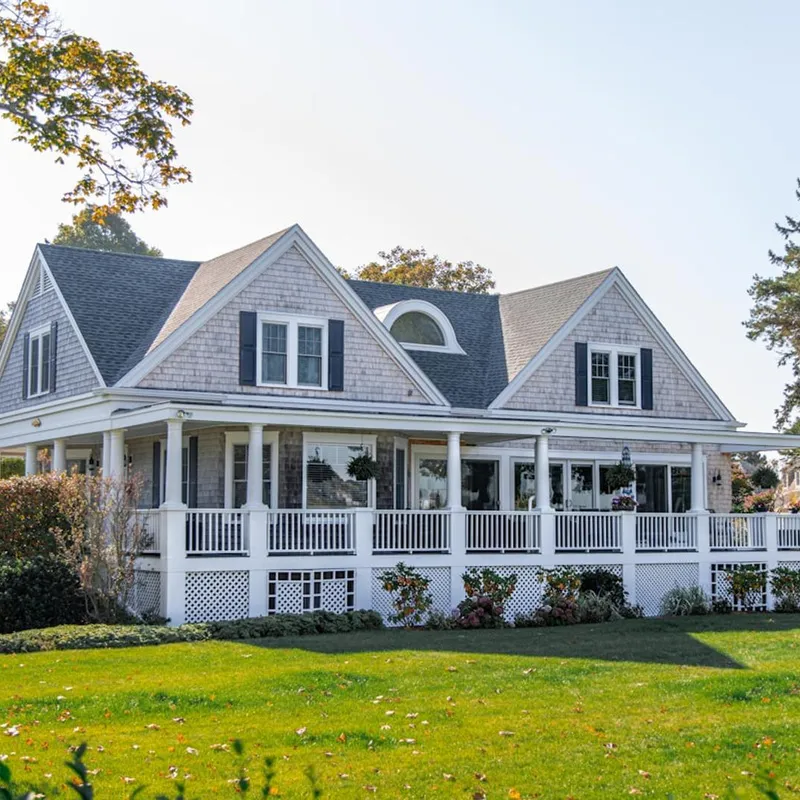 Well-maintained home showing the lasting results of roof restoration