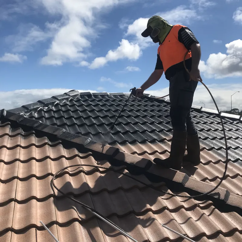 A freshly painted tile roof on a Perth home