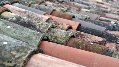 Older Perth roof showing ridge capping and tile condition typical of pre-1990s homes