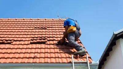 Displaced roof tile on a Perth home showing potential entry point for possums