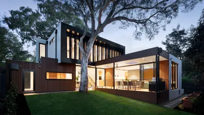 Perth home surrounded by trees that create ongoing gutter maintenance needs